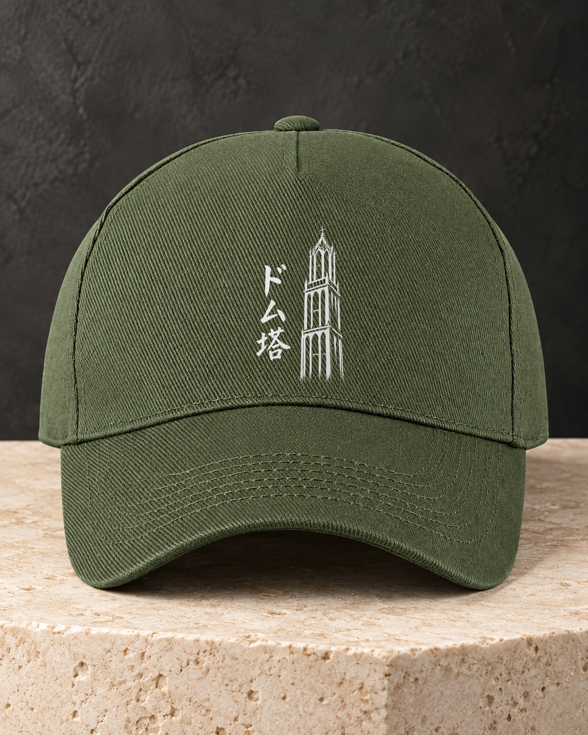 Kage Cap 影 — olive cap showing the Ink artwork