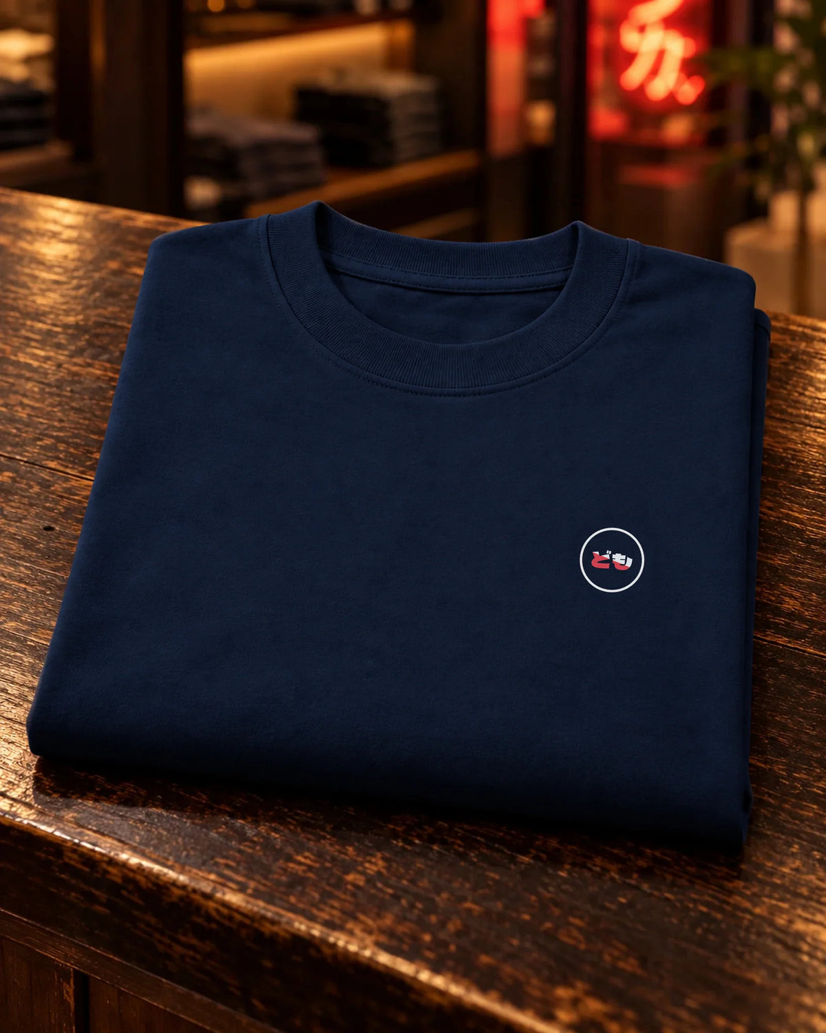 Fudō Neo — folded front with printed Domo chest logo