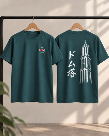 Kata Tee Embroidered 型 | Ink — front and back views on hangers, showing the embroidered chest logo and printed Ink artwork