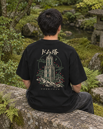 Fudō Tee 不動 | Zen Dark — back view showing the artwork in a Japanese setting