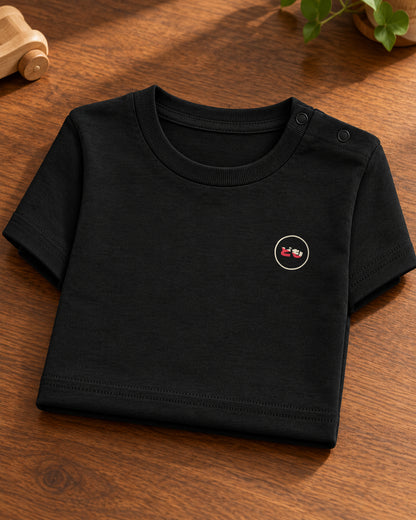 Hina Baby Tee 雛 | Ink — folded garment showing the Domo chest logo
