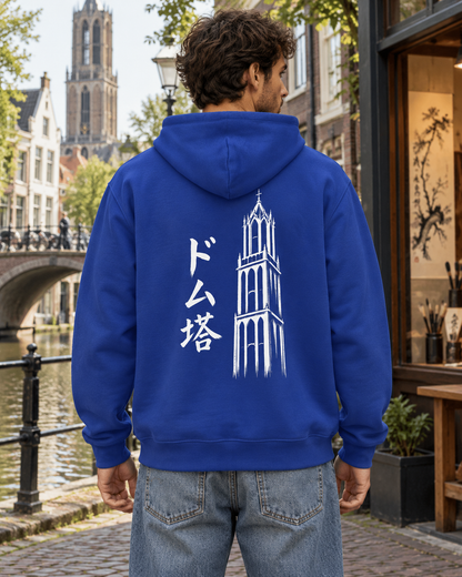 Nukumori Cruiser 2.0 350 GSM organic cotton fleece hoodie: RELAXED MEDIUM FIT, roomy chest and upper arms, shoulders gently relaxed, loose straight body and natural drape, comfortable streetwear, NOT slim or tight, NOT extreme oversized — Ink — back artwork on model
