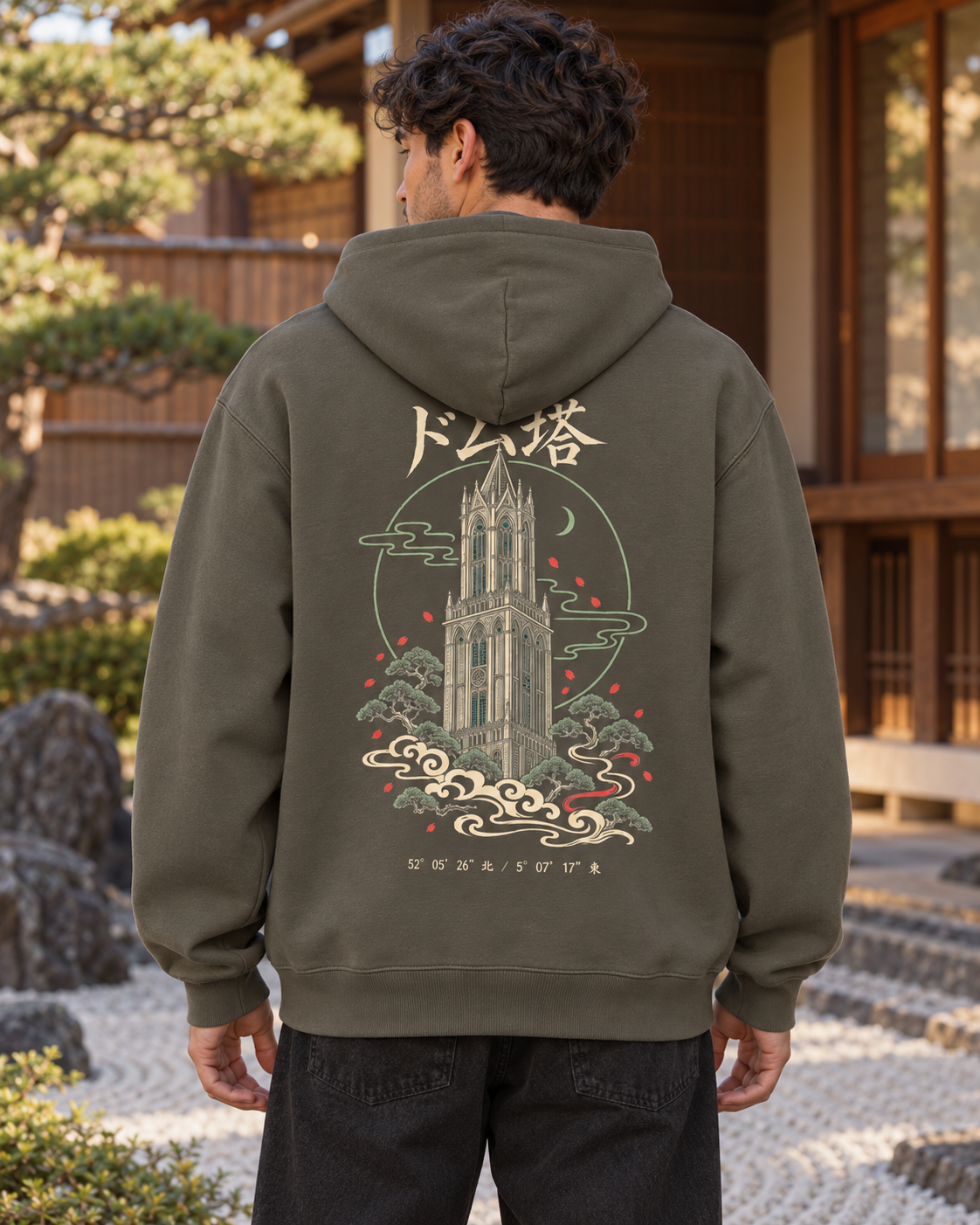 Nukumori Cruiser 2.0 350 GSM organic cotton fleece hoodie: RELAXED MEDIUM FIT, roomy chest and upper arms, shoulders gently relaxed, loose straight body and natural drape, comfortable streetwear, NOT slim or tight, NOT extreme oversized — Zen Dark — back artwork on model