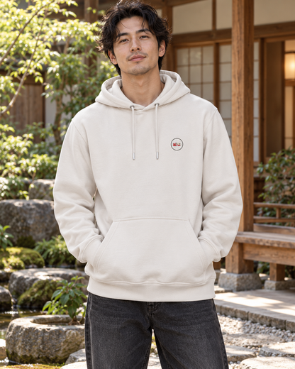Nukumori Cruiser 2.0 350 GSM organic cotton fleece hoodie: RELAXED MEDIUM FIT, roomy chest and upper arms, shoulders gently relaxed, loose straight body and natural drape, comfortable streetwear, NOT slim or tight, NOT extreme oversized — Zen Light — front logo on model
