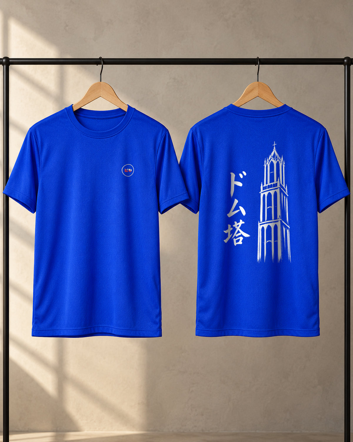 Kaze Sport 風 | Ink — front and back views on a clothing rack, showing the chest logo and Ink back print