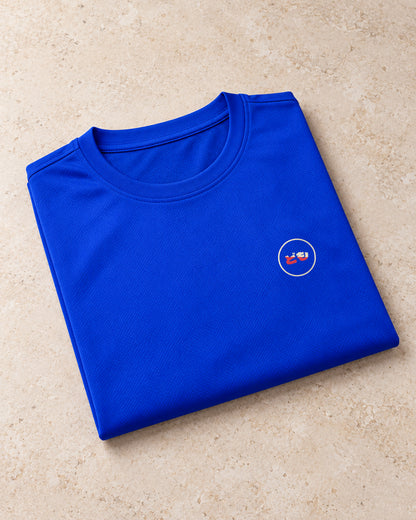 Kaze Sport 風 | Ink — folded shirt showing the Domo chest logo