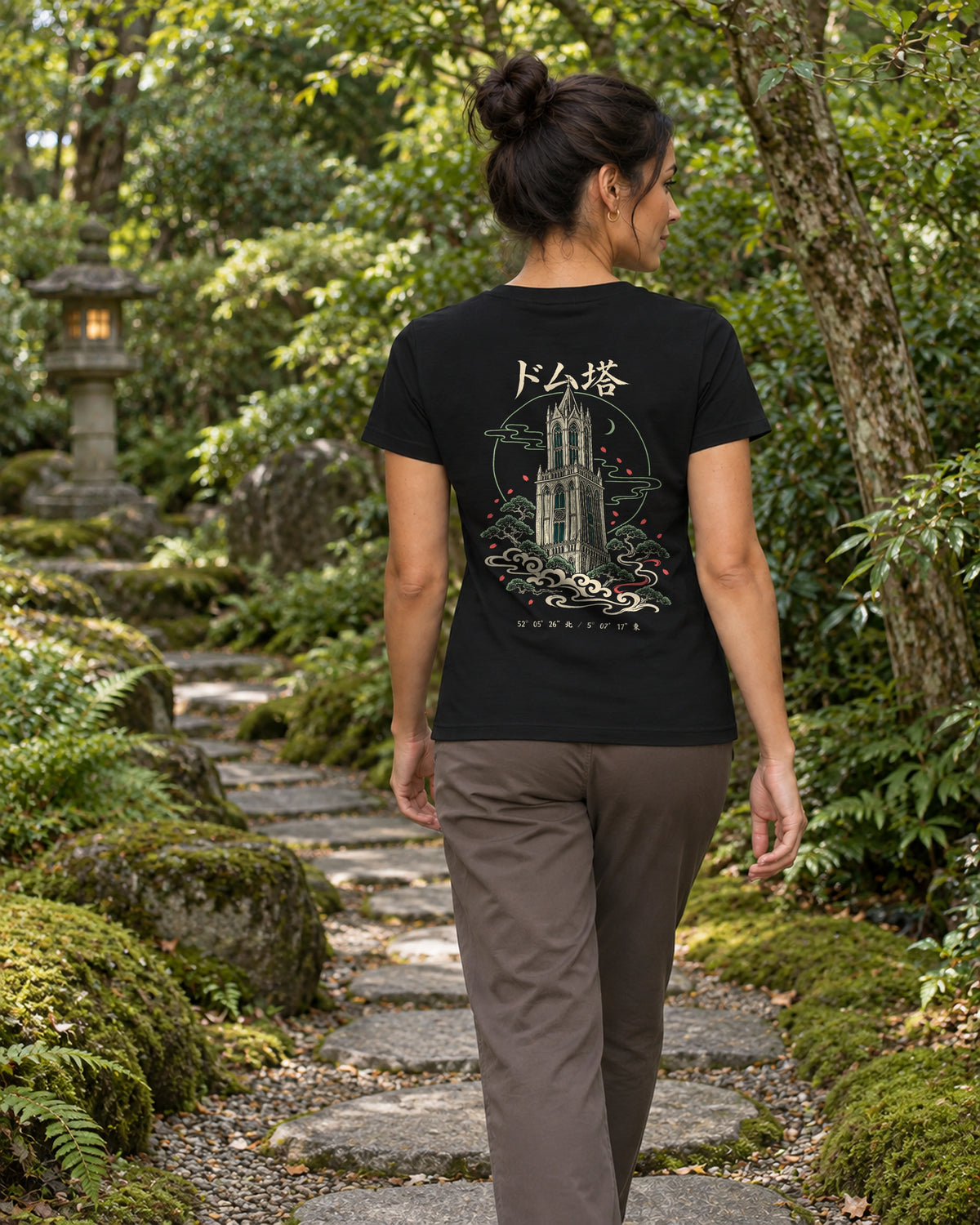 Saki Tee 咲 | Zen Dark — back view showing the artwork in a Japanese setting