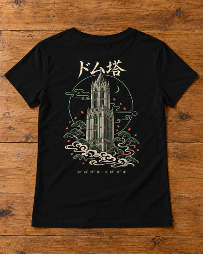 Saki Tee 咲 | Zen Dark — back artwork laid flat on a table