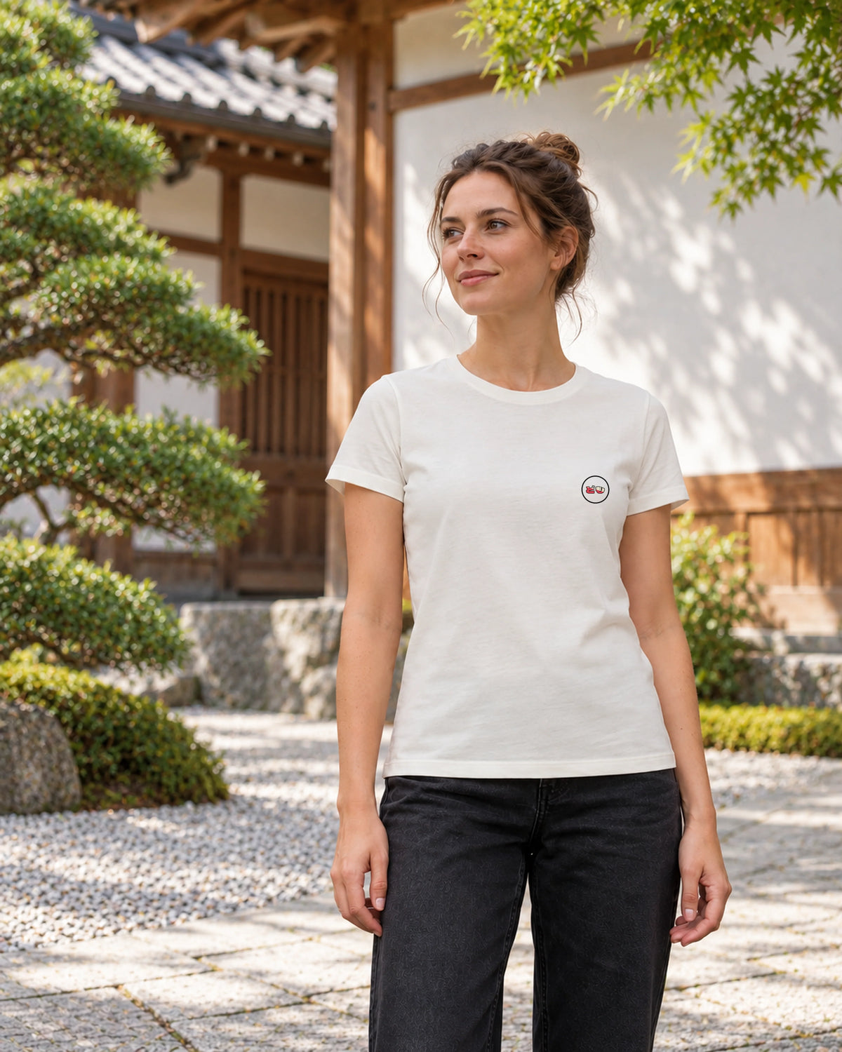 Saki Tee 咲 | Zen Light — front view showing the Domo chest logo in a Japanese setting